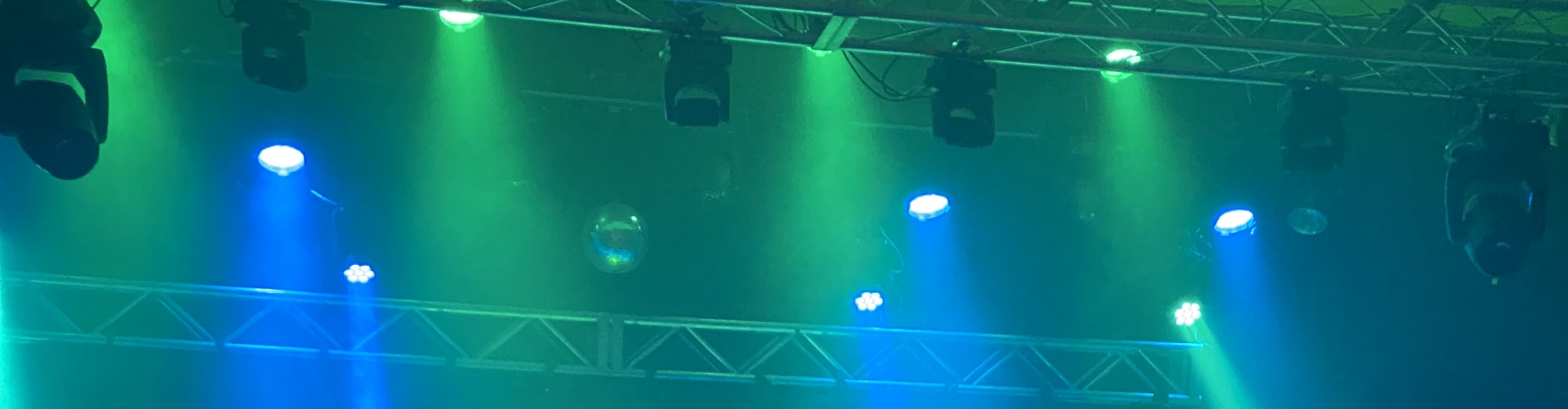 blue and green theater stage lights East Lansing