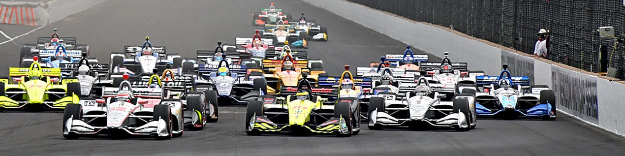 indy cars racing to through the start line East Lansing